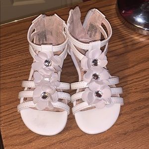 White toddler sandals with floral embellishments